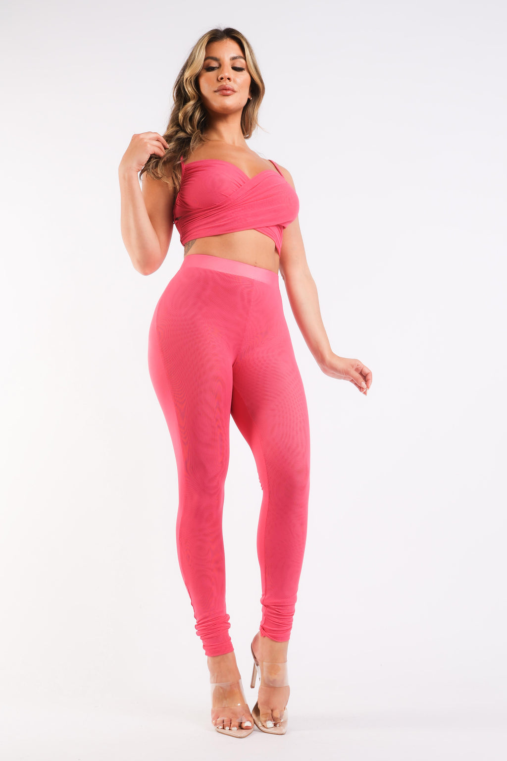 Completo sportivo casual con top a maniche corte e leggings a contrasto in rete FUCSIA