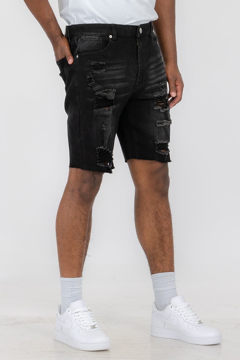 Pantaloncini in denim effetto consumato da uomo