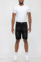 Pantaloncini in denim effetto consumato da uomo