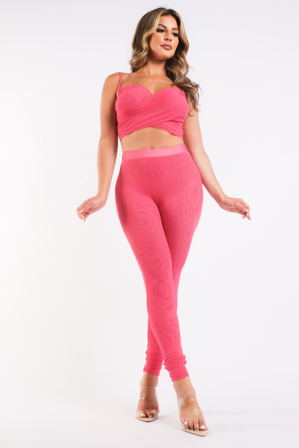Completo sportivo casual con top a maniche corte e leggings a contrasto in rete FUCSIA